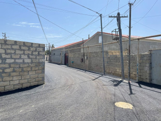 Pirşağı qəsəbəsində asfaltlanma işləri aparılıb
