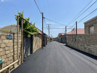 Pirşağı qəsəbəsində asfaltlanma işləri aparılıb