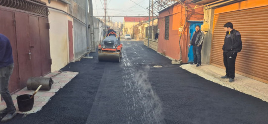 Bakıxanov qəsəbəsində asfaltlanma işləri aparılıb
