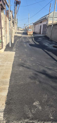 Bakıxanov qəsəbəsində asfaltlanma işləri aparılıb