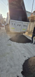 Bakıxanov qəsəbəsində asfaltlanma işləri aparılıb
